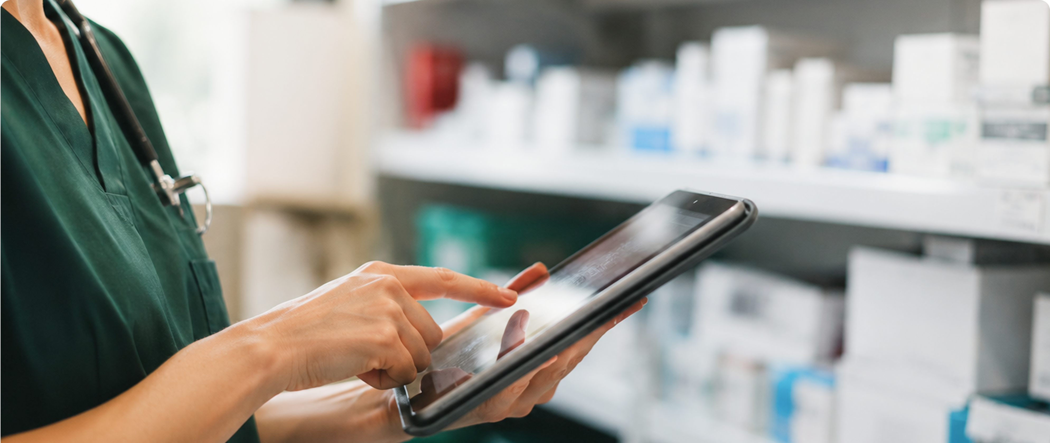 Clinician reviewing products on a tablet